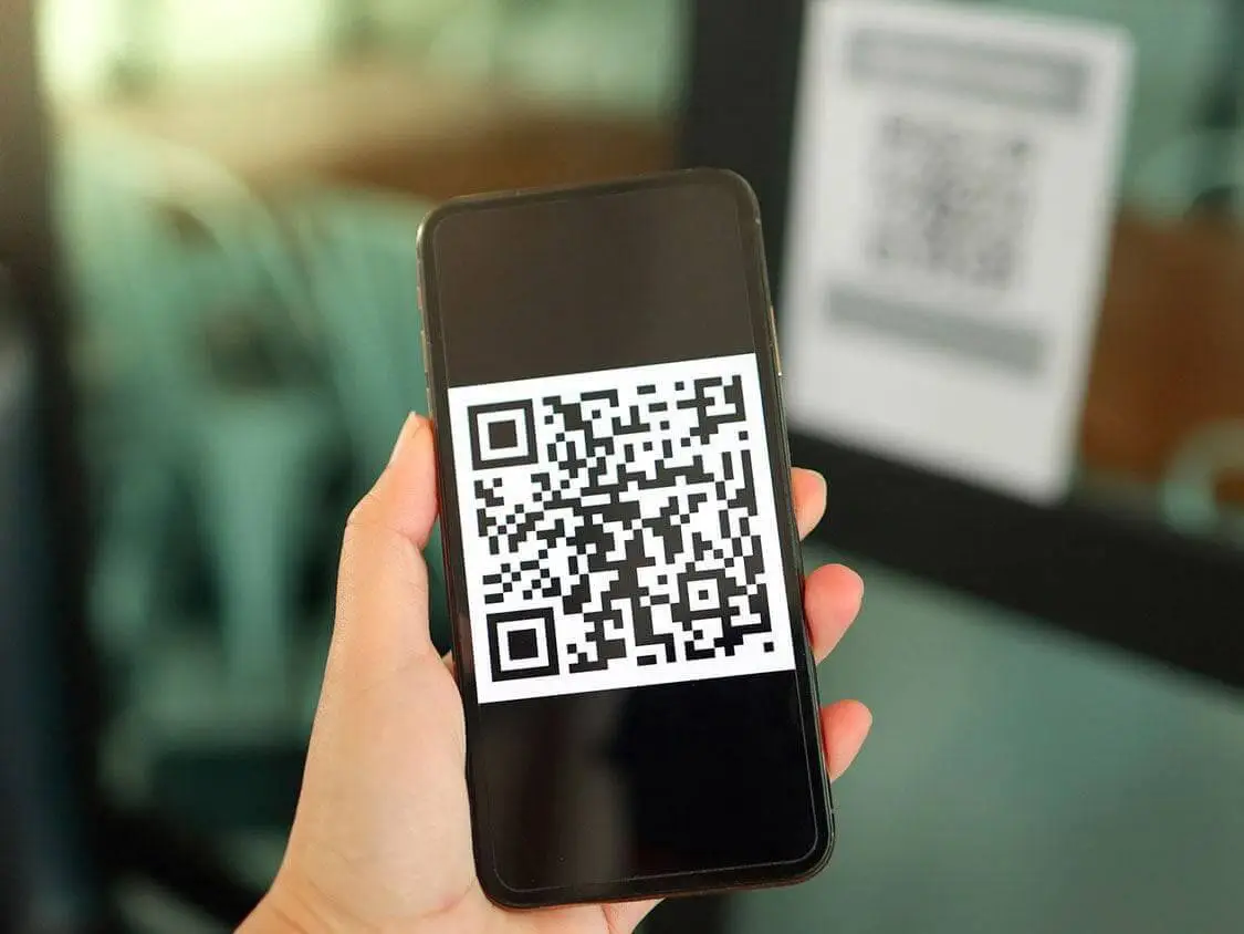 Hoe scan ik een QR-code van een screenshot of foto?